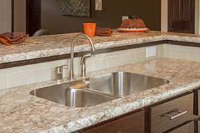 Undermount sink with a laminate top